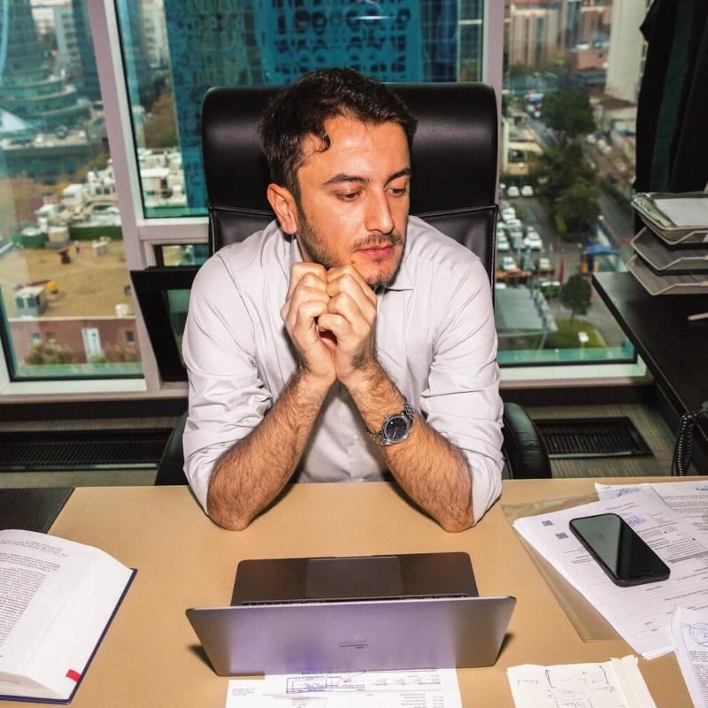 A business man sitting at his desk in the office