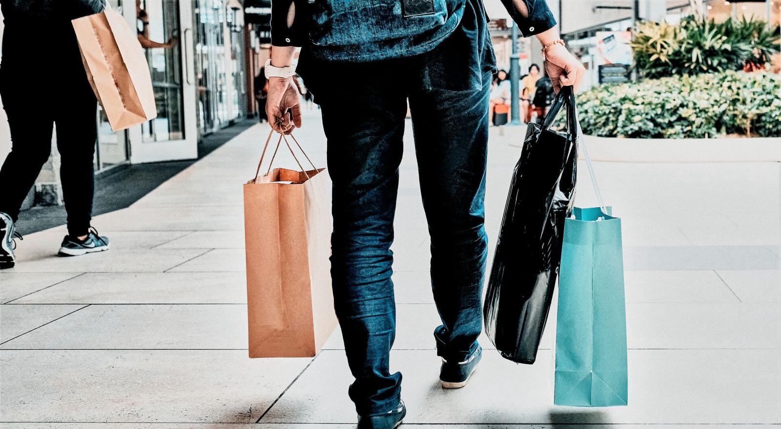 Large Web and Screen Low section of a person walking outside with shopping bags