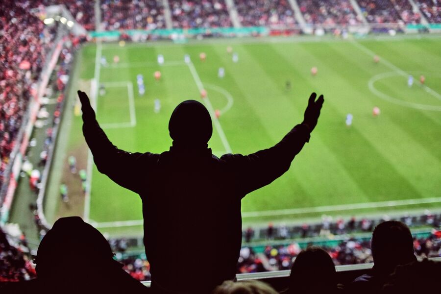 Medium Office 365 and Newsletters Person at the top of a football stadium gestures that the referee's decision was unjustified