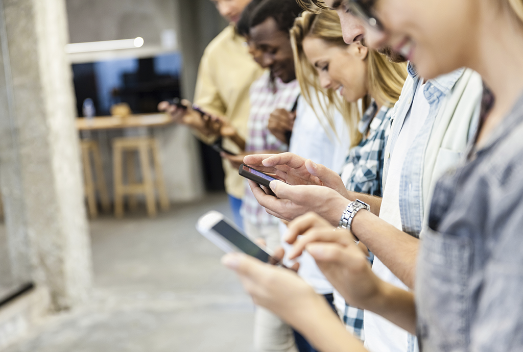 Group of people are using their telephone