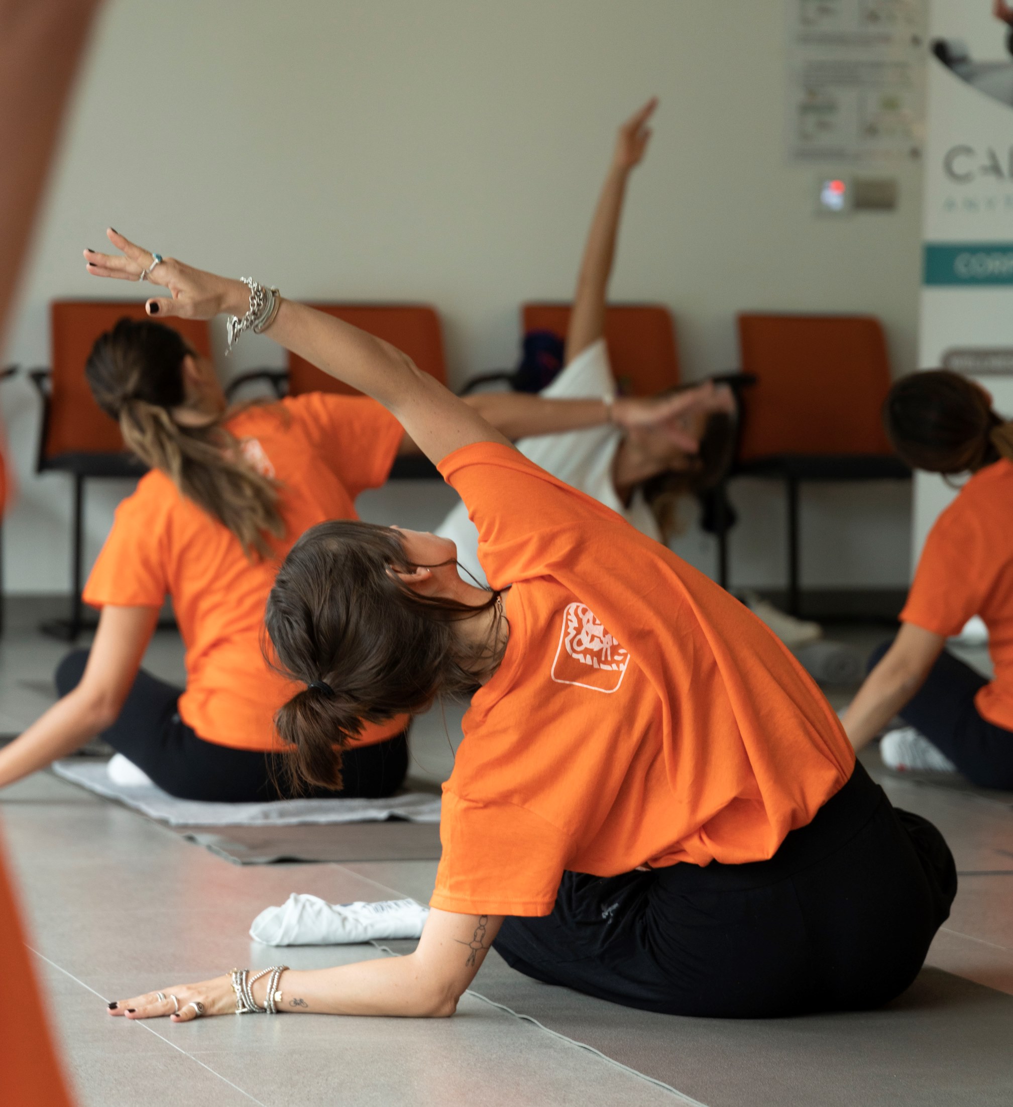 Group of women are practing yoga