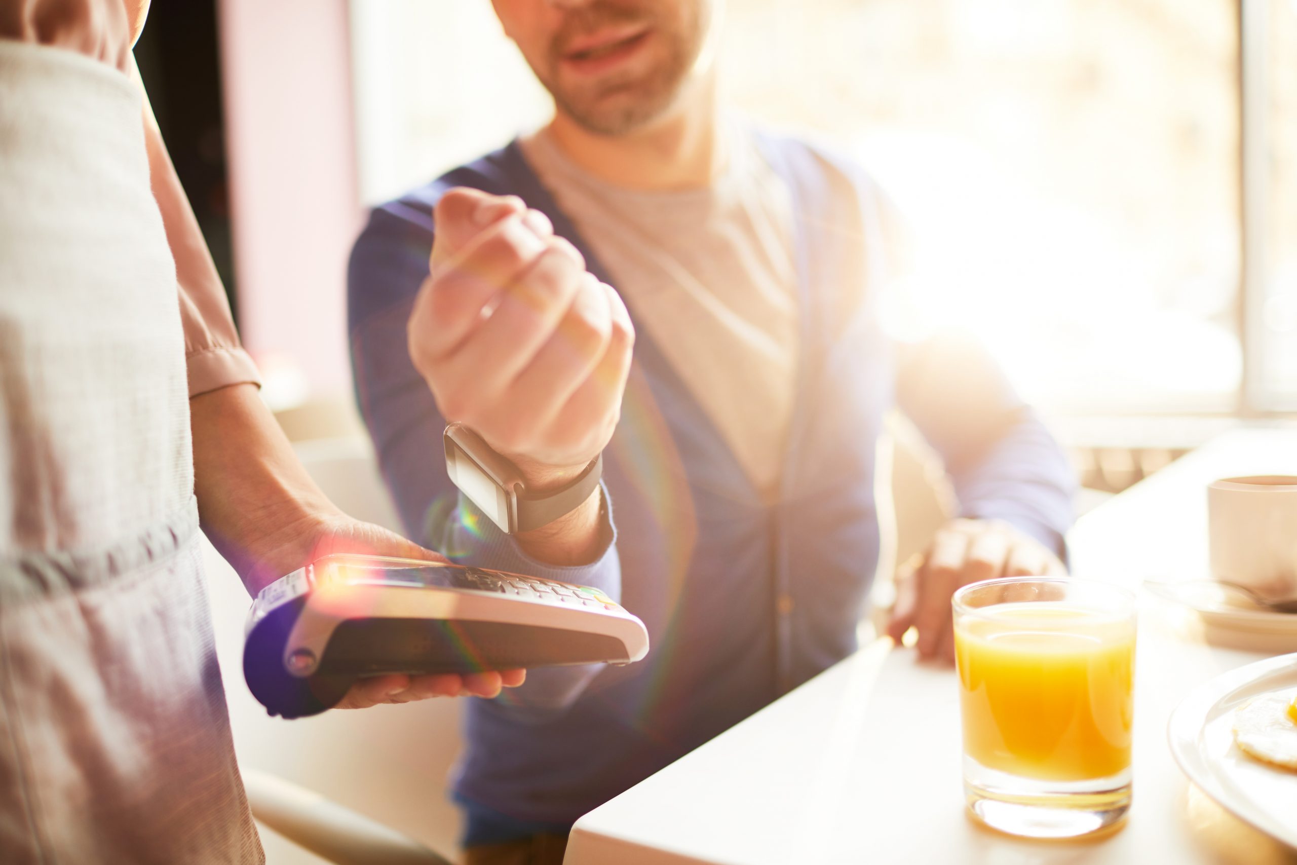 Man pay a ticket using the smartwatch 